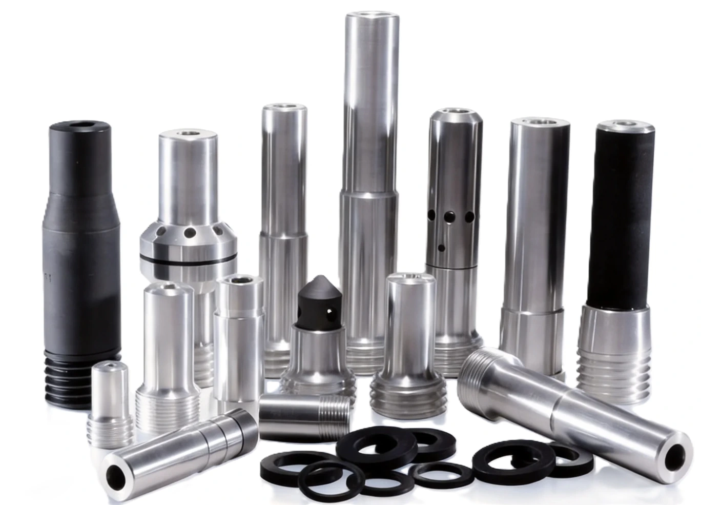 Nozzles – assorted straight and stepped nozzles, many with threaded ends, with sealing washers
